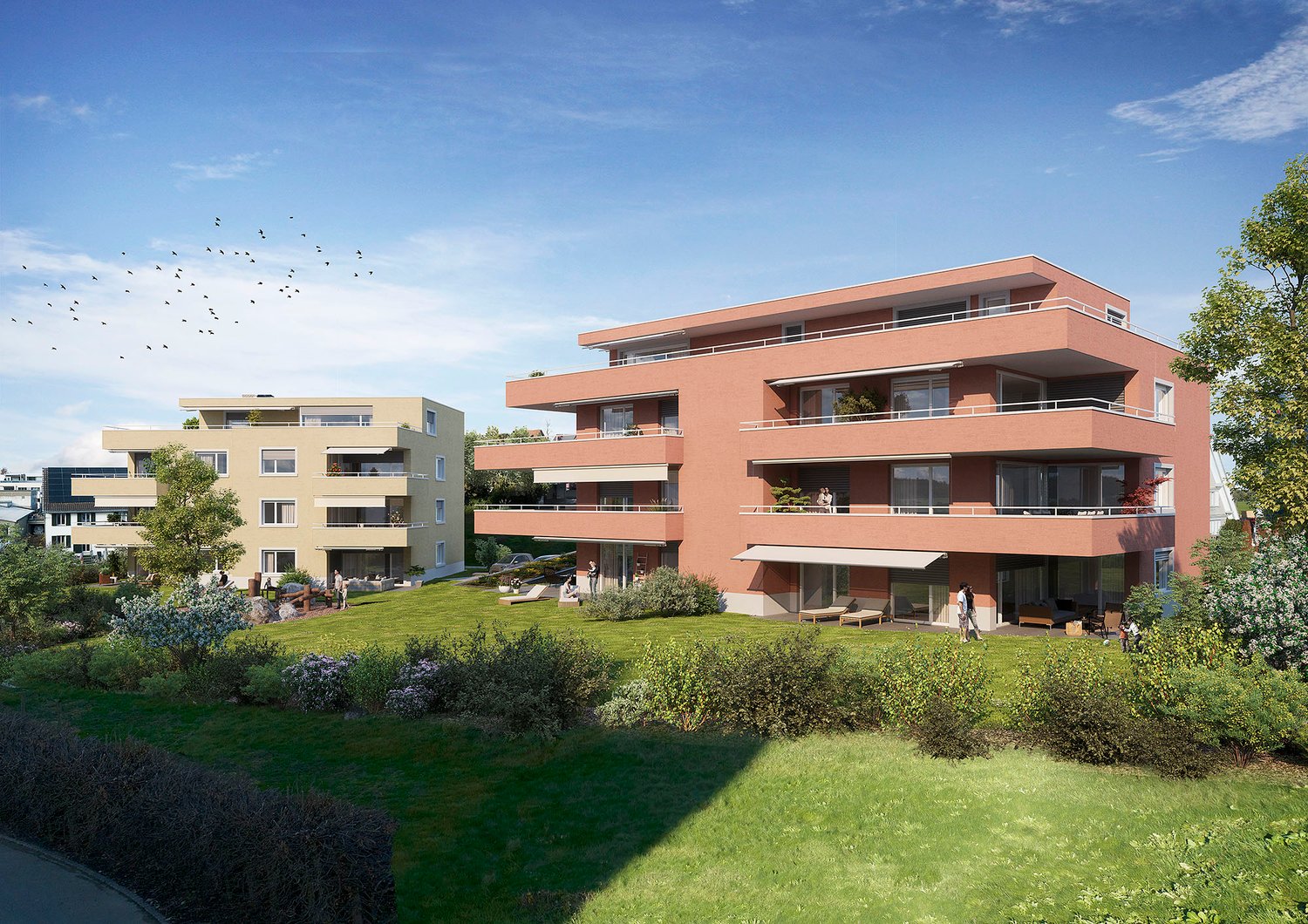 A modern apartment building with red exterior, several balconies, and a well-maintained green lawn.