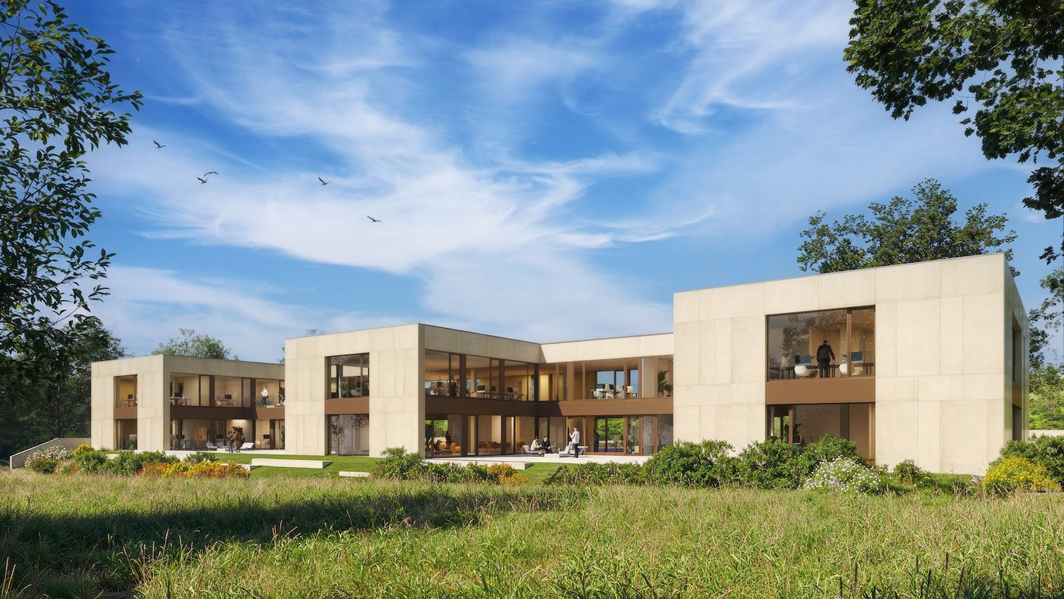 Modern two-story house with large windows, balconies, and surrounded by a grassy lawn and trees