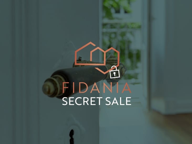 Logo for Fidania Secret Sale, features a door handle and keyhole