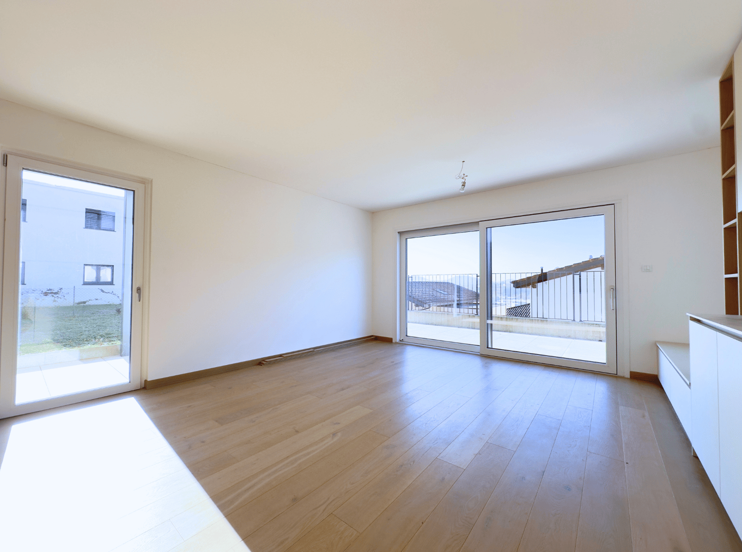 empty room, large windows, wooden floor, terrace