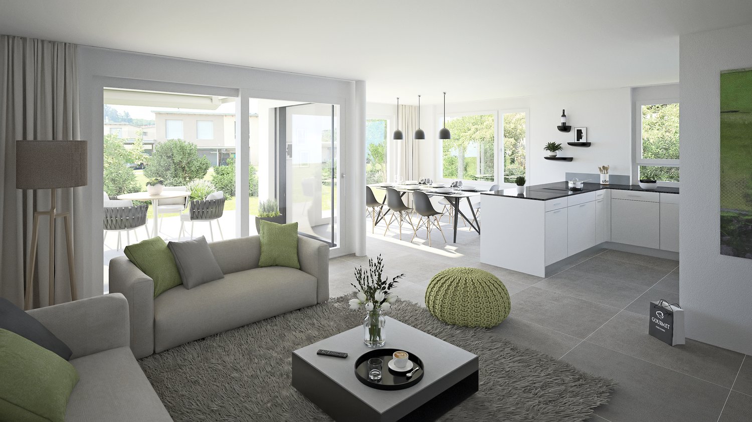 Open-concept living room and kitchen with large windows, grey sofa, green accent pillows, coffee table, dining table and chairs, modern kitchen with white cabinets and countertops, pendant lighting, and access to a balcony or terrace.