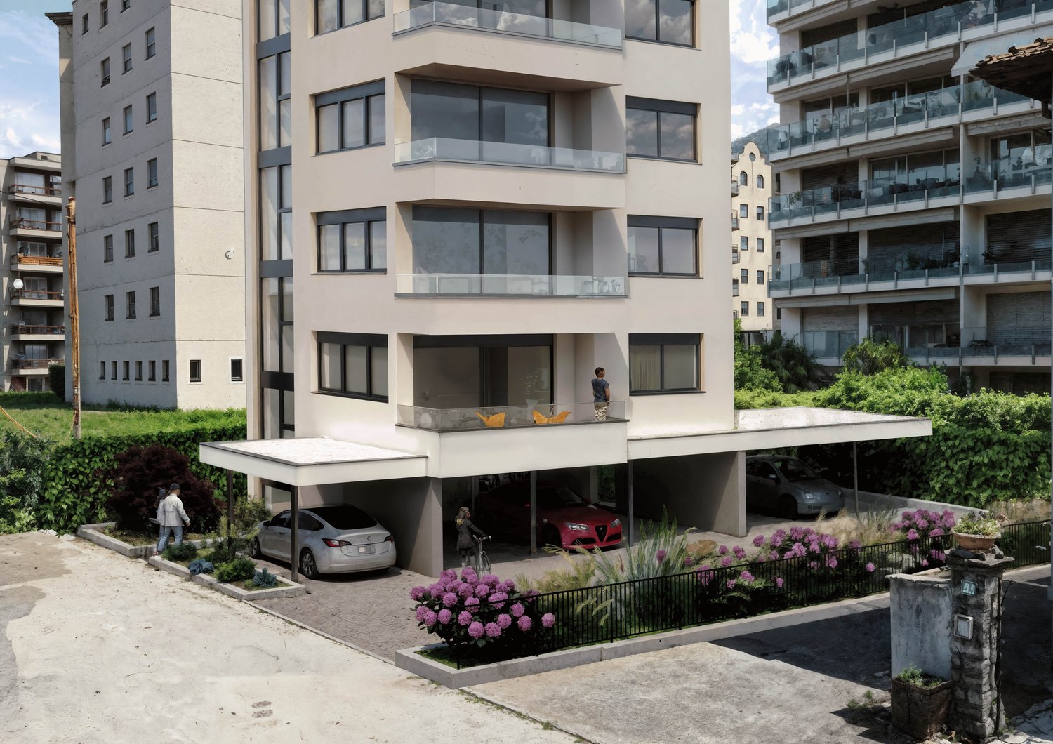 Multi-story apartment building with balconies, parking spaces, and landscaped gardens in the front