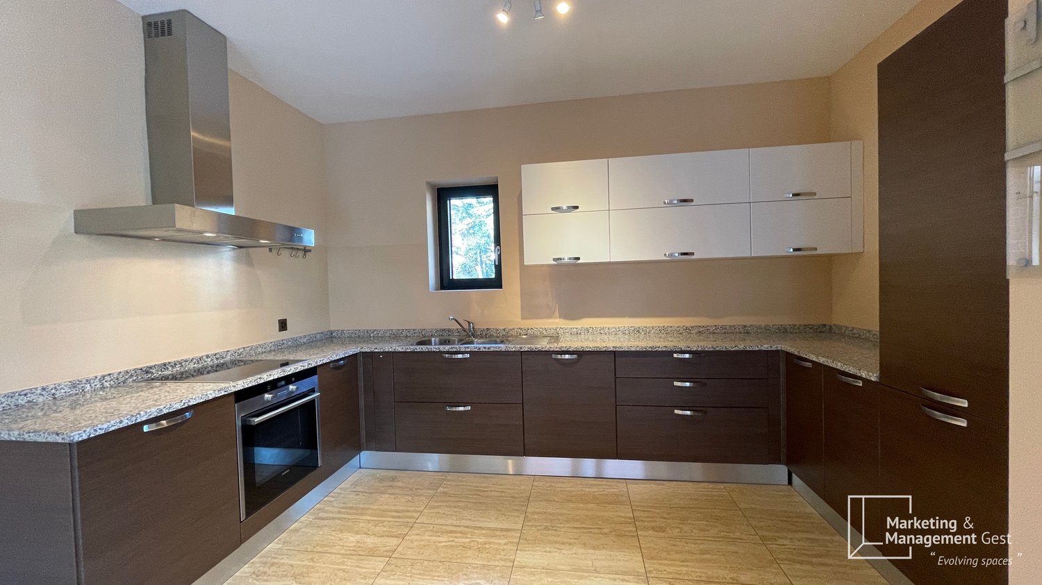 modern kitchen, marble countertop, built-in oven, granite backsplash, white cabinets, stainless steel hood, granite countertop