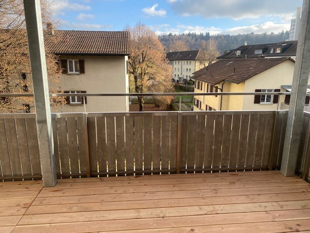 Wooden terrace, wooden fencing, overlooking the city