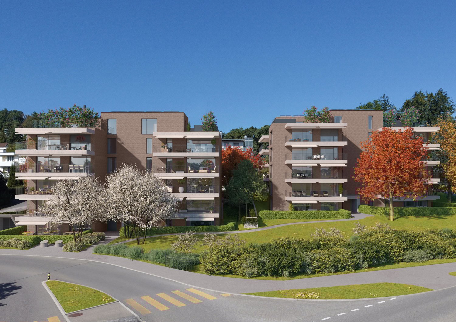 Multi-story apartment buildings with balconies, surrounded by landscaped gardens and trees. The buildings have a modern, minimalist design with clean lines and large windows.