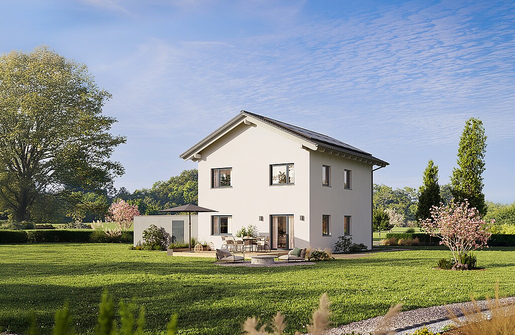 Two story house, solar panels, white walls, gray roof, glass door, outdoor seating area, fireplace, fire pit, umbrella, garden, grassy lawn