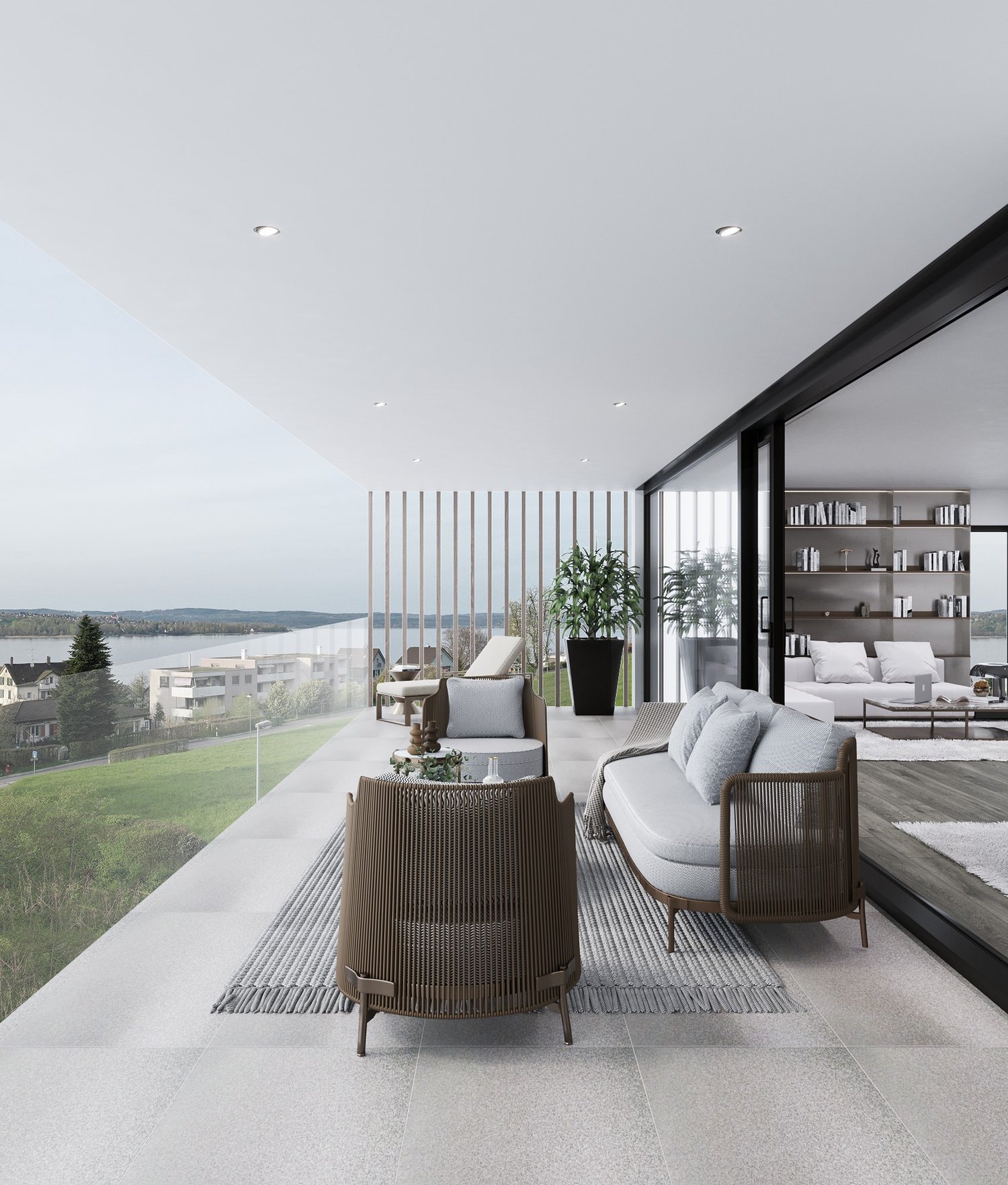 Spacious living room with large windows offering a scenic view, modern furniture including a sofa and armchairs, a coffee table, and shelving units. The room has a minimalist and contemporary design with a neutral color palette.