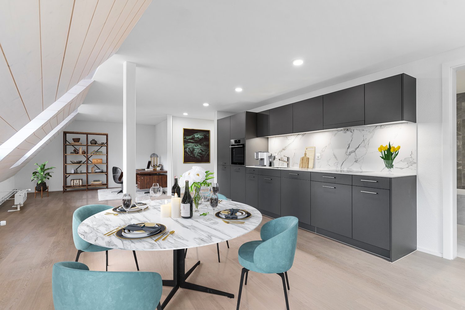 wooden floor, white walls, gray cabinets, marble countertop, dining table, blue chairs, flowers, wine bottles, wine glasses, chandelier, painting