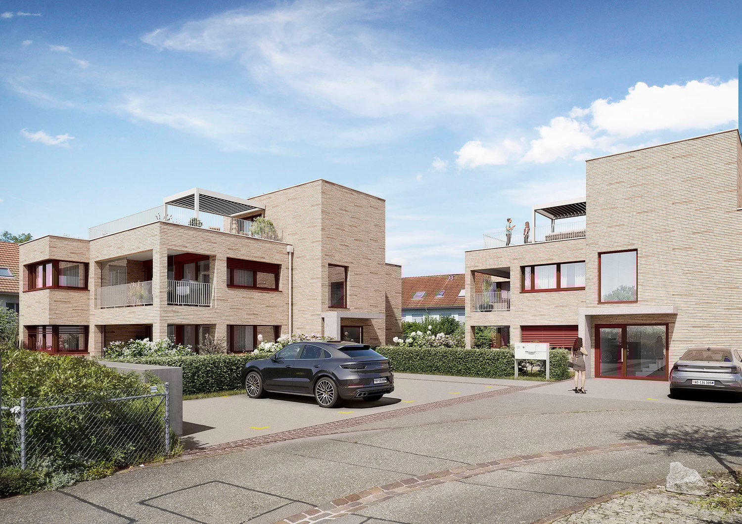 multifamily houses, brick facade, glass doors, balconies, greenery in front, parking spaces