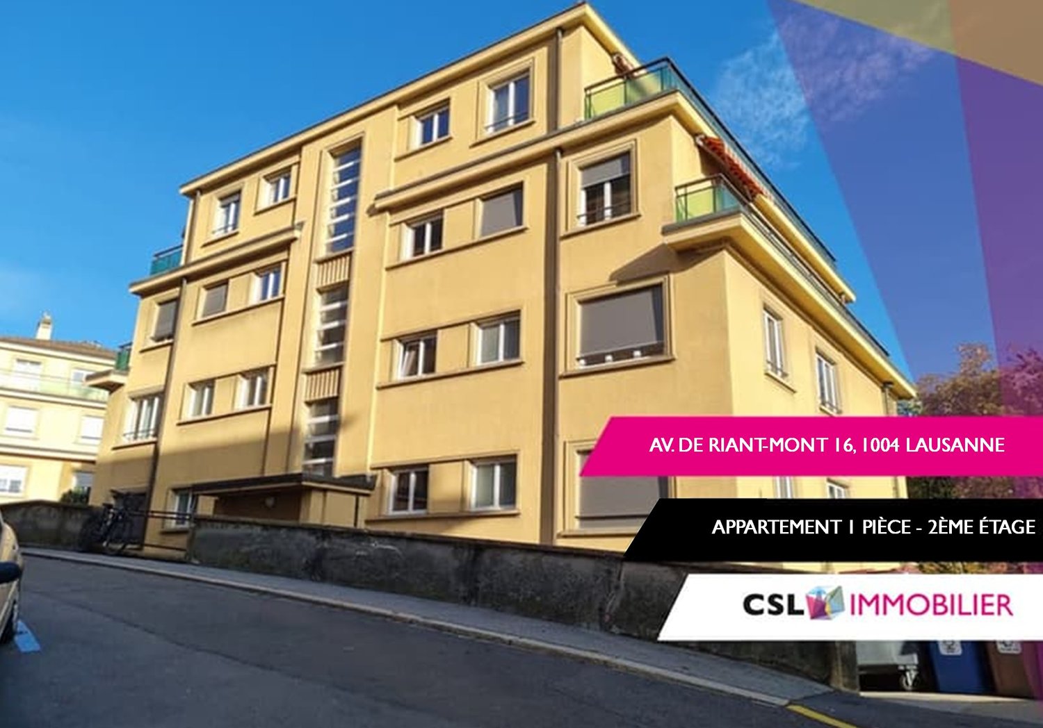 A multi-story yellow apartment building with balconies, located in Lausanne, featuring several windows, a driveway, and a bicycle parked in front.