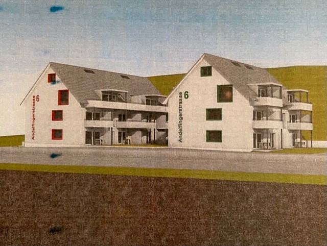 Apartment building, 2 stories, white exterior, red trim windows, small balconies