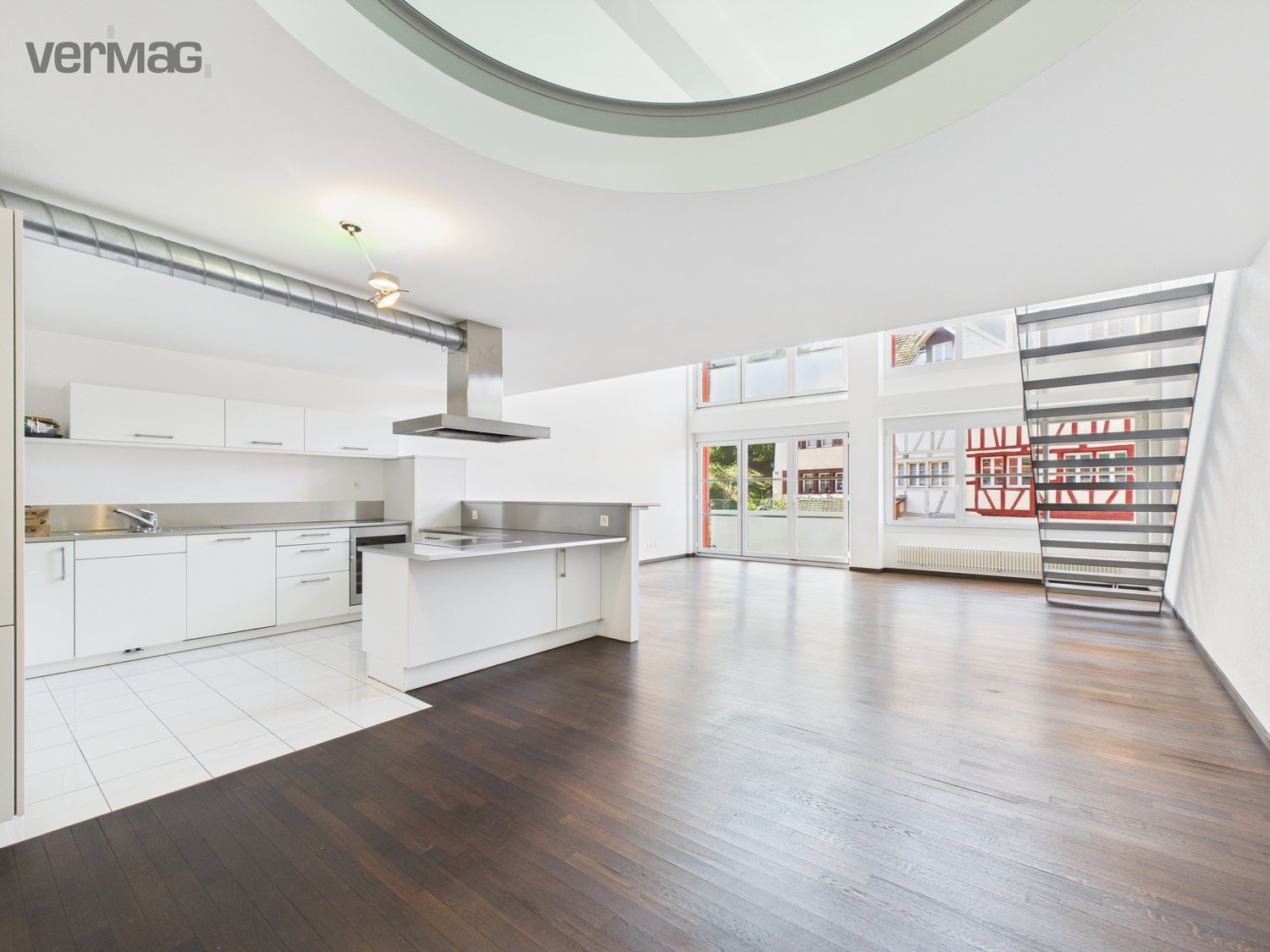 open kitchen, wooden floors, white kitchen, glass sliding doors