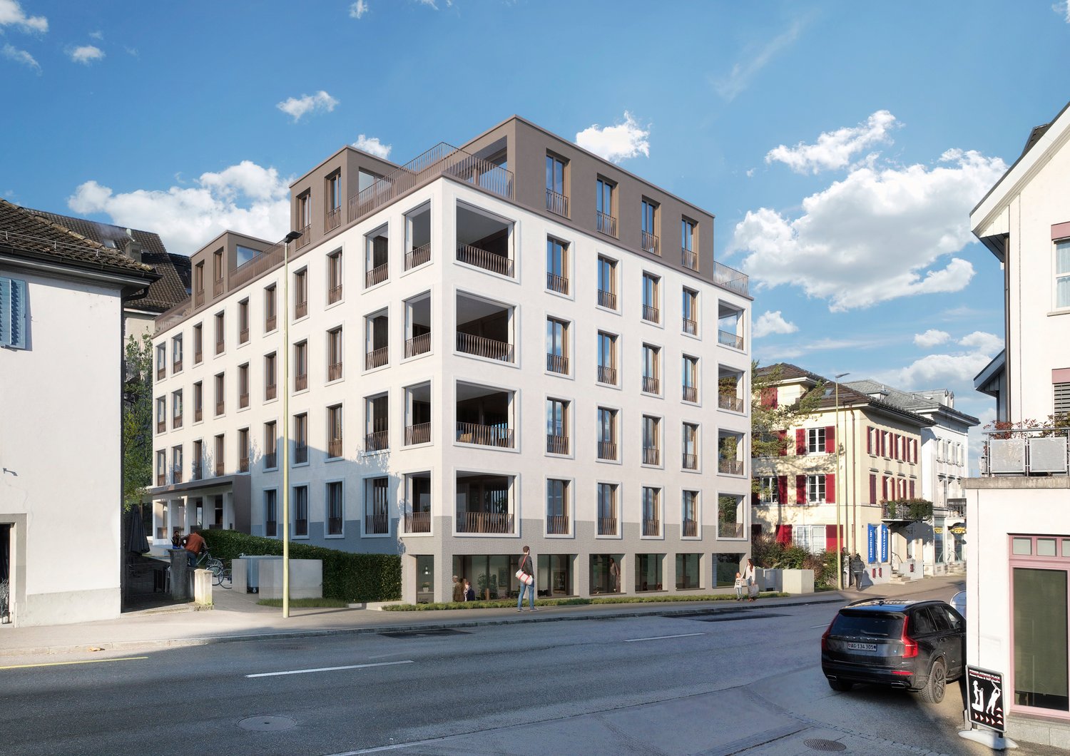 6-story building, white and grey, large windows, balconies