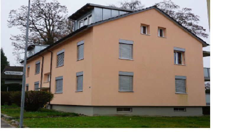 3-story house, beige facade, multiple windows, metal shutters, chimney, ground-level basement