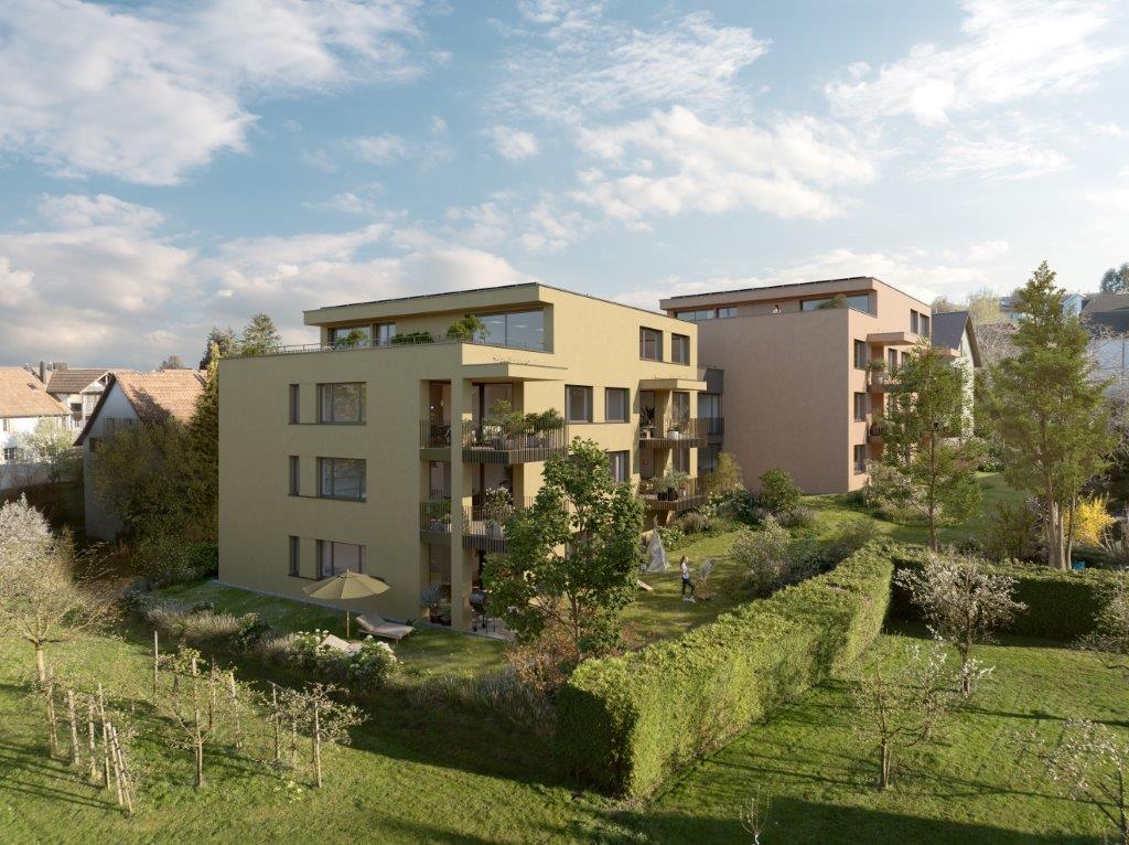 Multi-story apartment building with balconies, surrounded by a well-maintained garden with trees and landscaping.