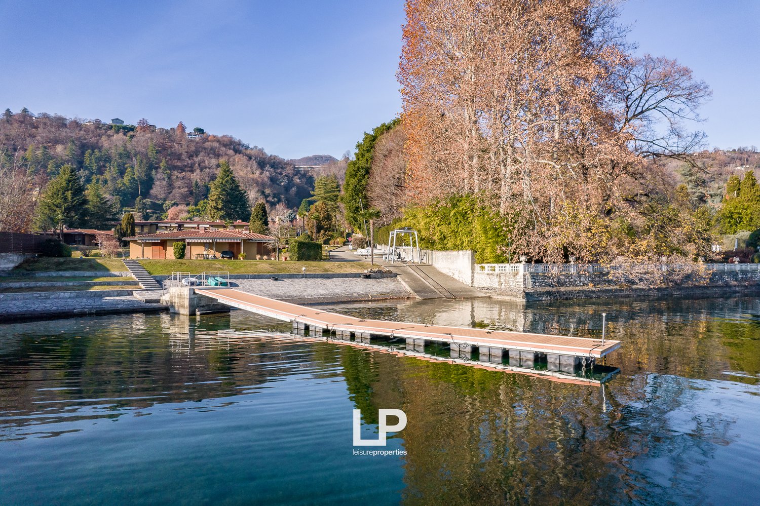 lake, dock, distant house