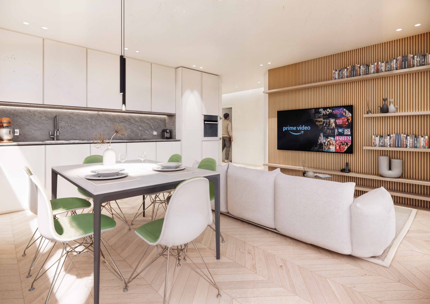 Open-concept living room and kitchen with modern, minimalist design. The kitchen features a gray stone backsplash, built-in appliances including a dishwasher, and a dining table with green chairs. The living room has a white sofa and a large TV mounted on