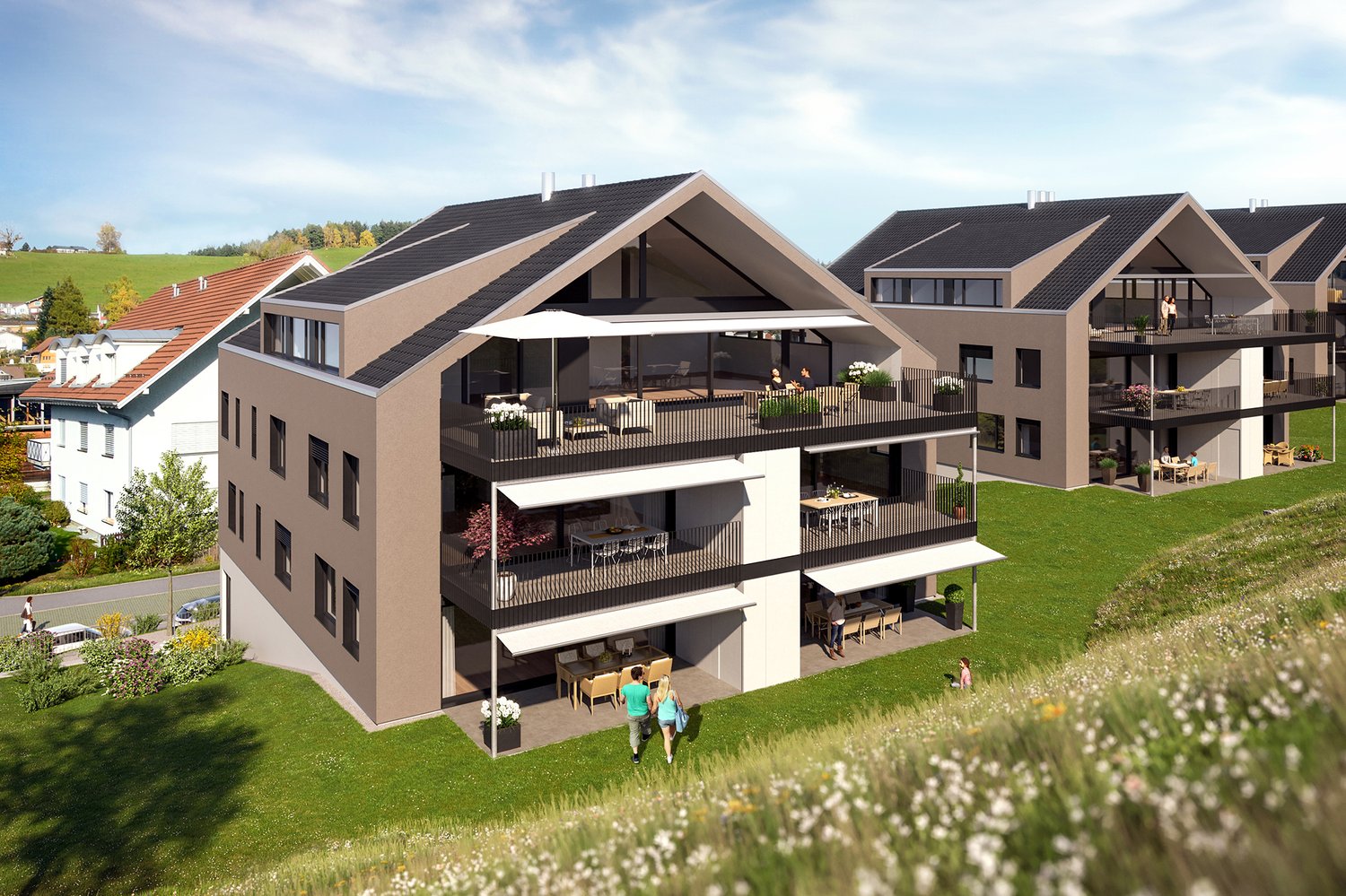 Modern apartment complex with balconies, grassy terrain, raised building