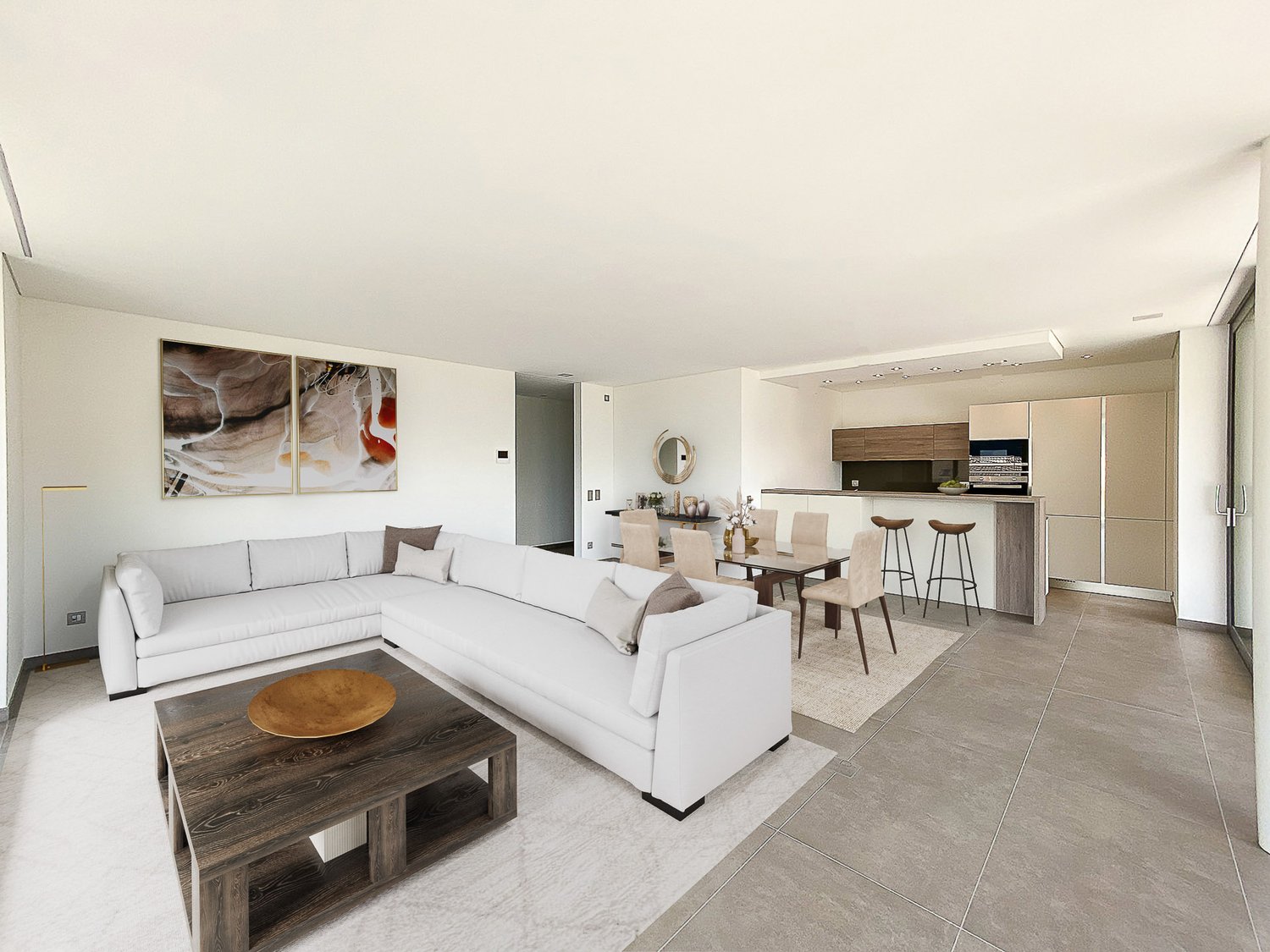 open living space with white couch, table, and kitchen island