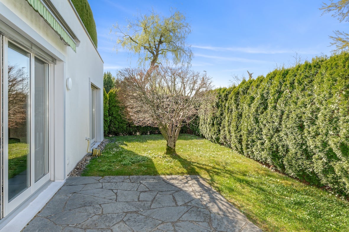 private garden with lawn, tree, hedges, paved patio