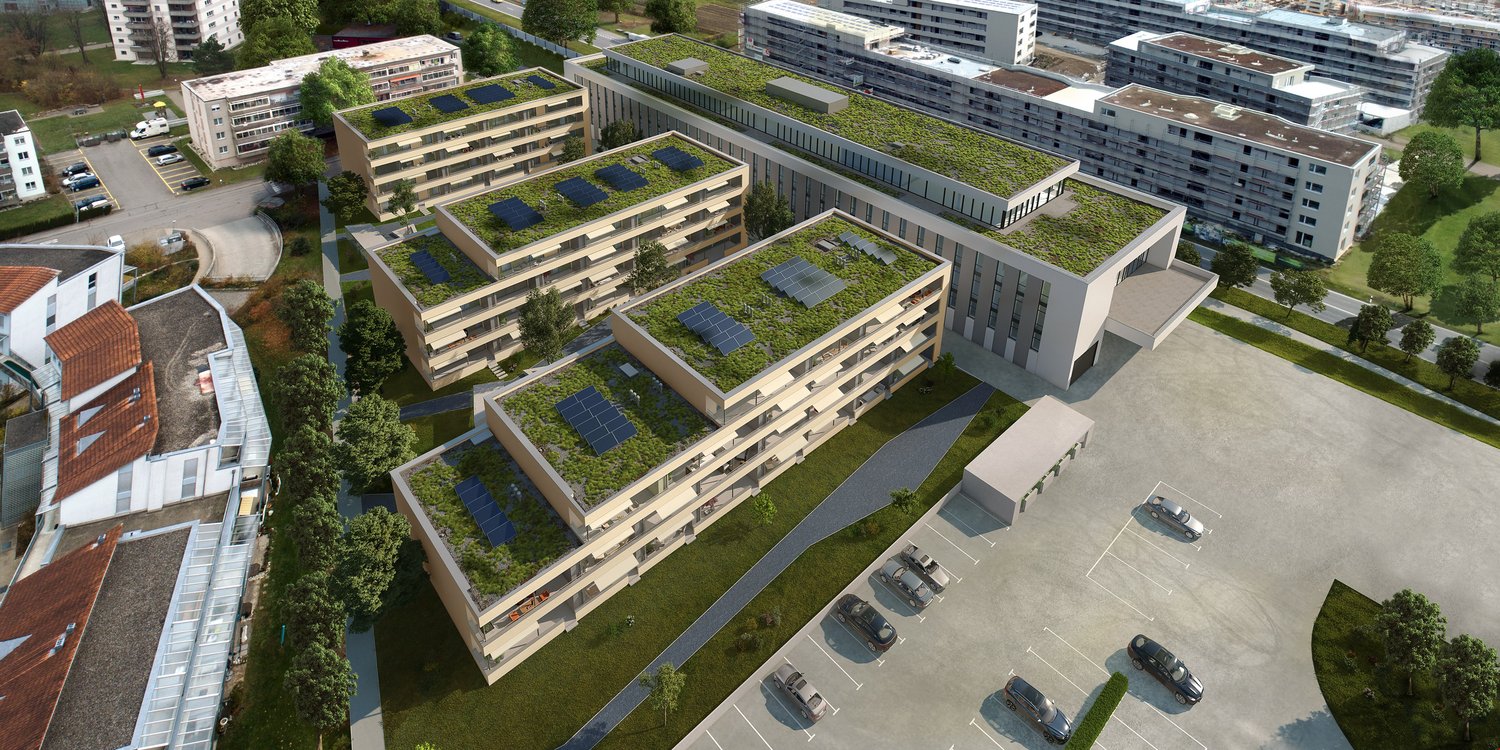 4-story apartment complex with grass rooftop, solar panels, large parking lot